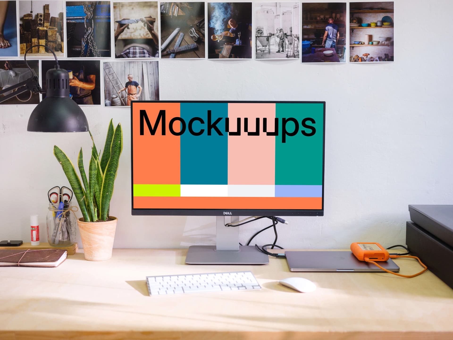 designer reviewing mockup template settings on laptop at clean desk