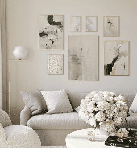 warm neutral living room interior with framed wall art above sofa