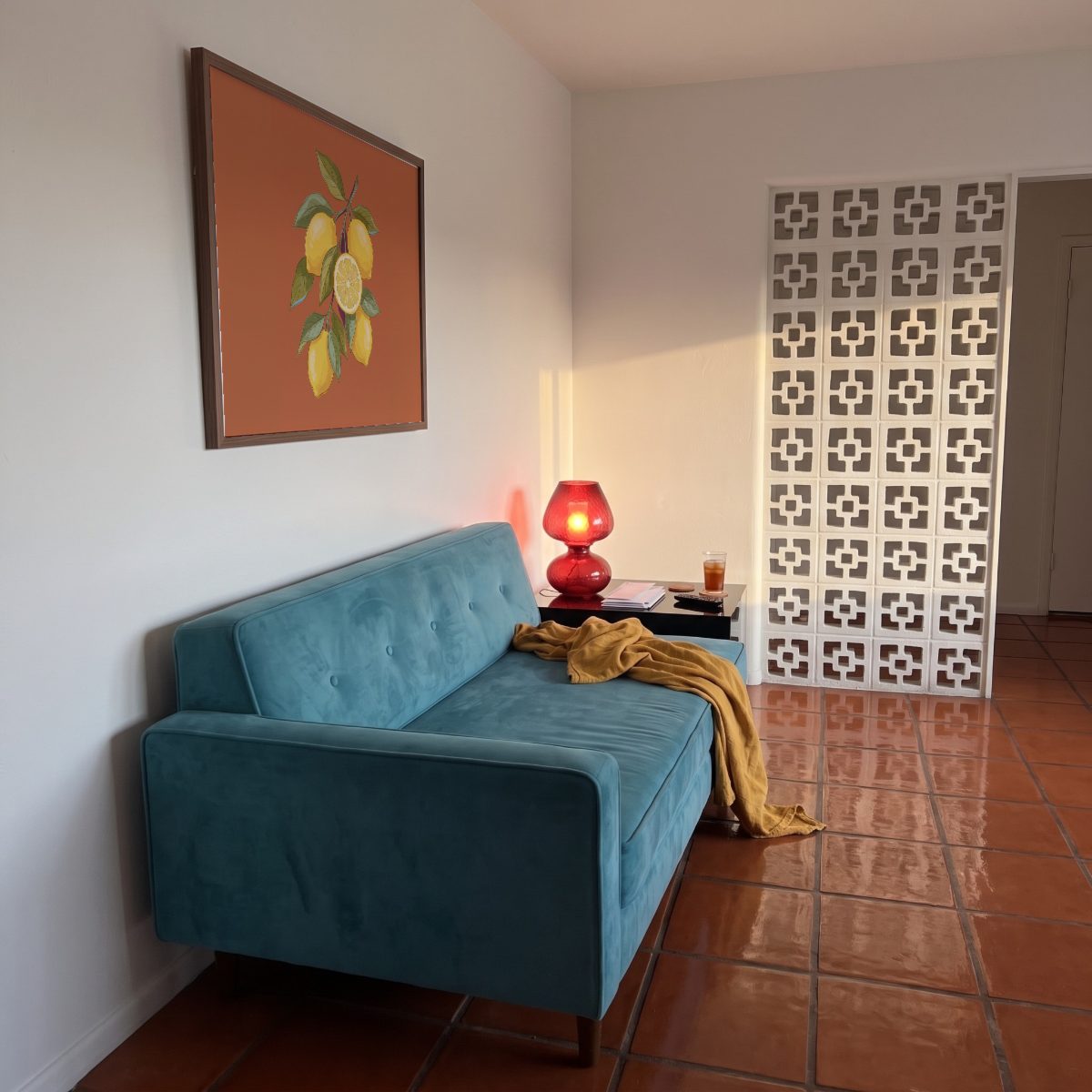 Terracotta Living Room Frame Mockup, on the wall, with a sample print